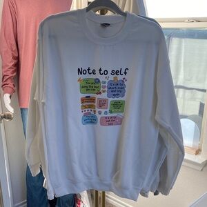 White Graphic Sweatshirt with Positive Notes